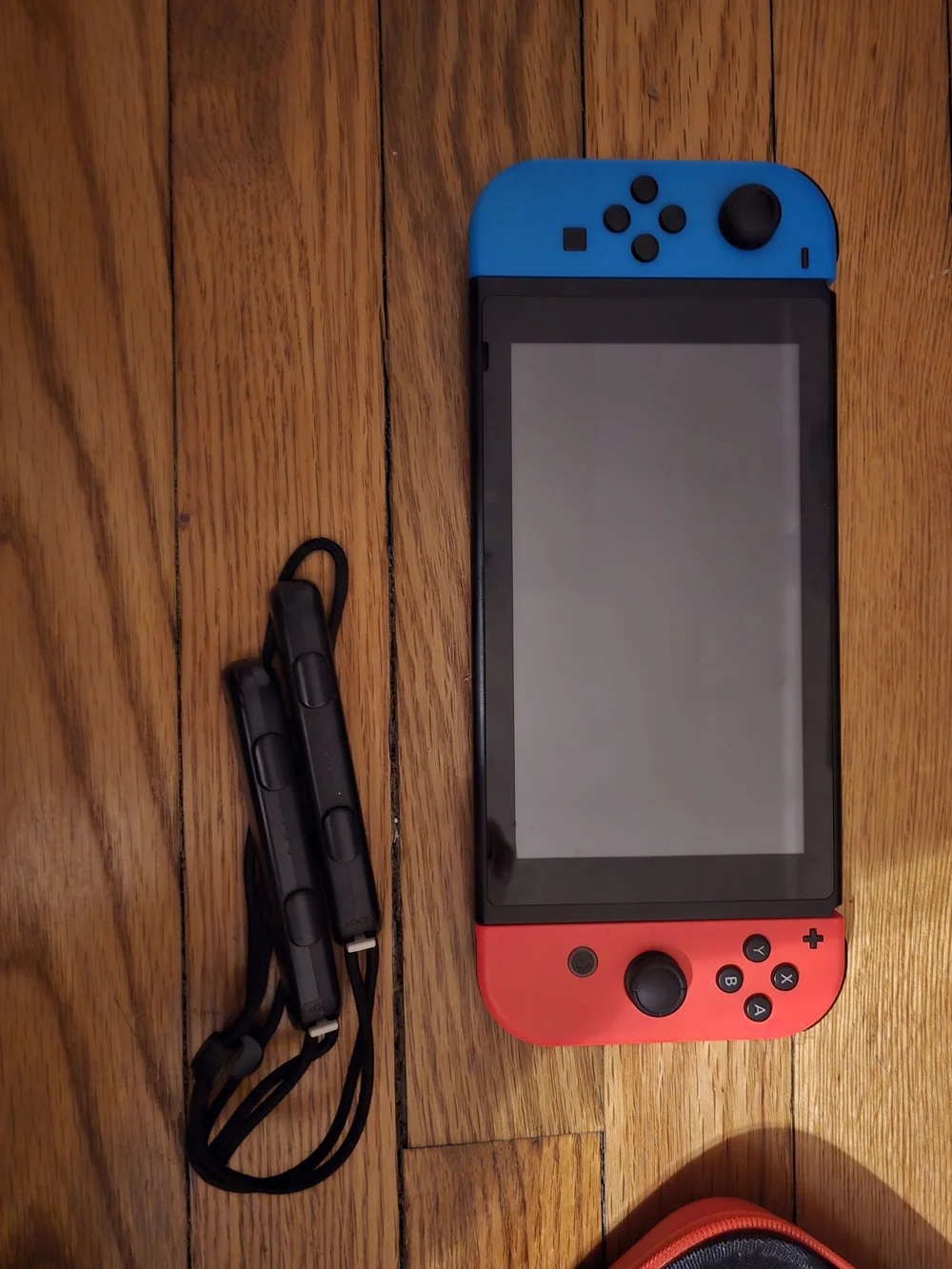 Nintendo Switch Handheld Console with Neon Blue and Neon Red Joy-Con